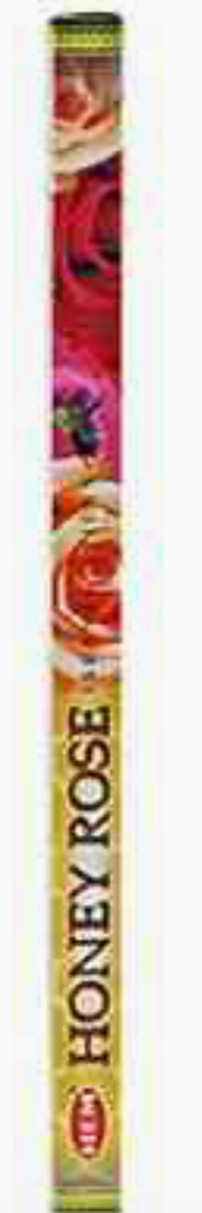 Honey Rose incense stick packaging with images of fruits and flowers on a red background.