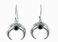 Silver earrings with black stones on a white background