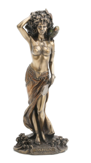 Bronze statue of a woman with intricate detailing on a white background