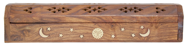 Wooden incense box with celestial designs on a wooden background