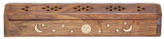 Wooden incense box with celestial designs on a wooden background