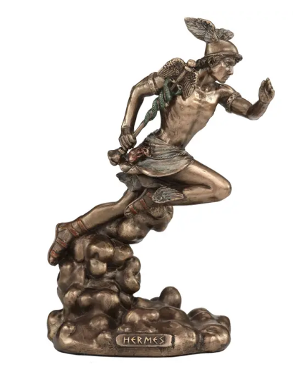 A bronze-finished statue of Hermes running forward over a cloud-like base, with a plaque at the bottom reading 'HERMES'. The sculpture is shown against a plain white background.