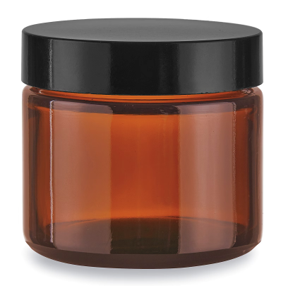 Amber jar with lid on a white background