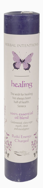 Candle labeled 'Healing' with butterfly design on a white background