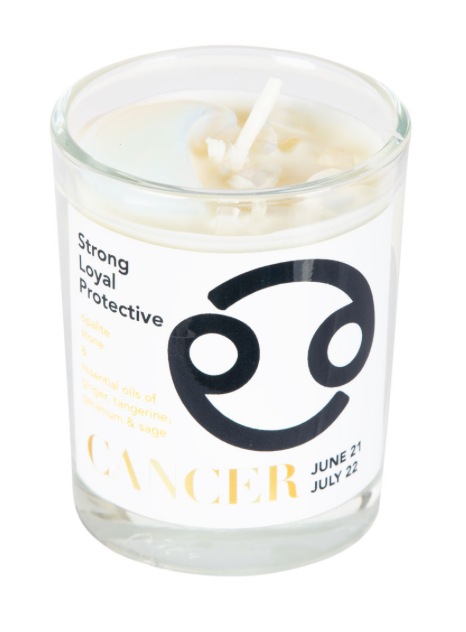 Candle in a glass jar with Cancer zodiac symbol and descriptive text on a white background