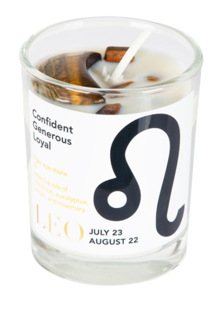 Glass candle with Leo zodiac symbol and descriptive text on a white background