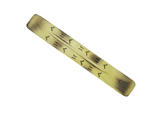 A rectangular, incense burner with dark markings, isolated on a white background.