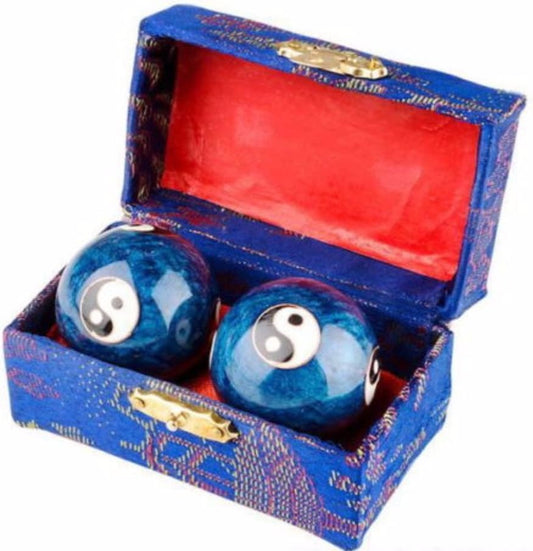 image of blue Yin Yang Therapy Balls in a blue and red box