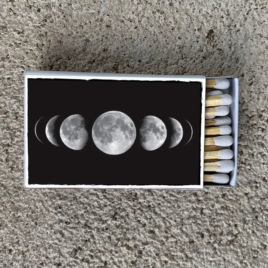 matchbox with moon phases, black and white
