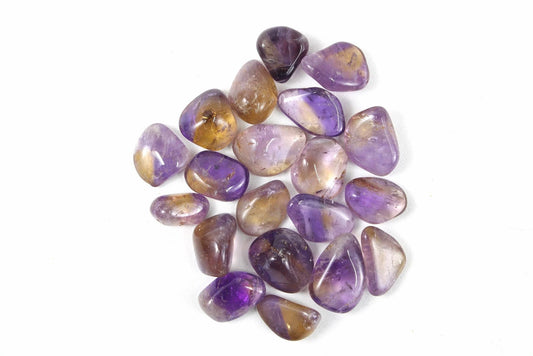 tumbled translucent purple and yellow stones in various shapes and colours