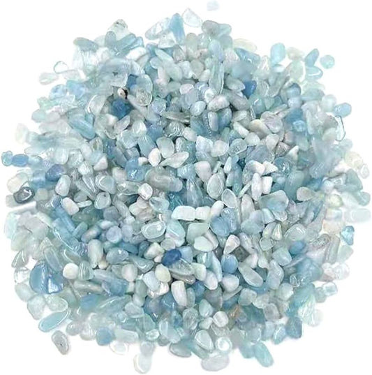 Tiny tumbled chips of semi-translucent greenish blue stones in varying shades