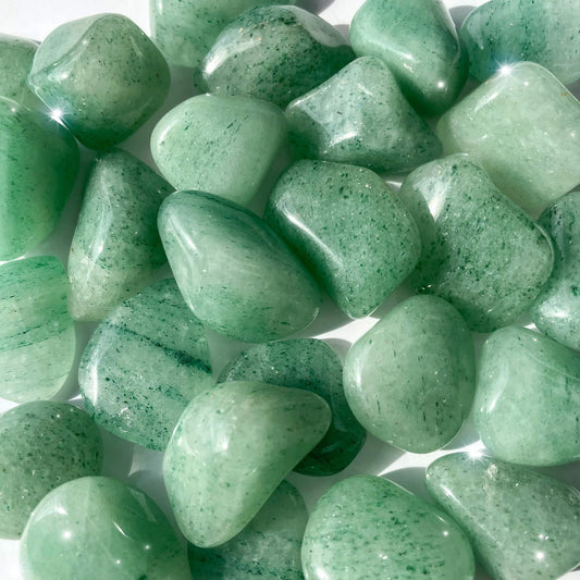 semi-translucent green tumbled stones with darker green flecks