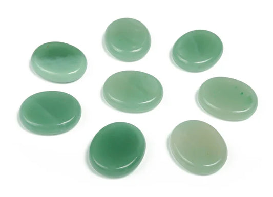 semi-translucent green flat oval stones with darker green flecks