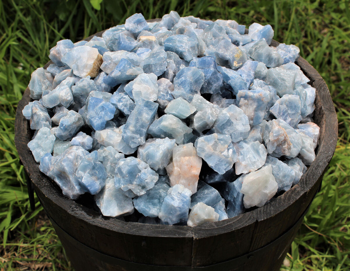 raw pieces of light blue stone with a waxy smooth surface