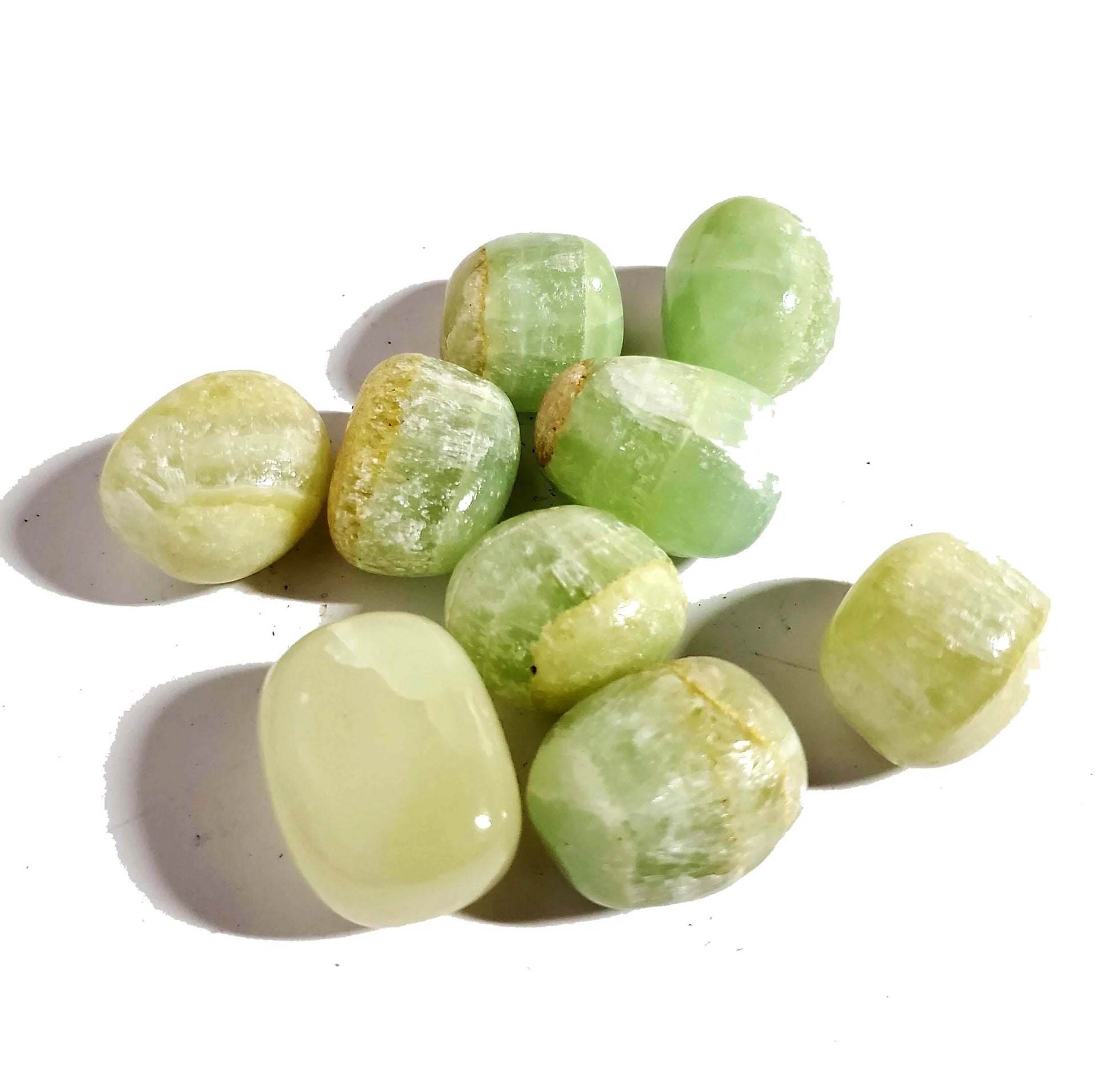 Smooth, tumbled, light green stones with a shiny waxy finish