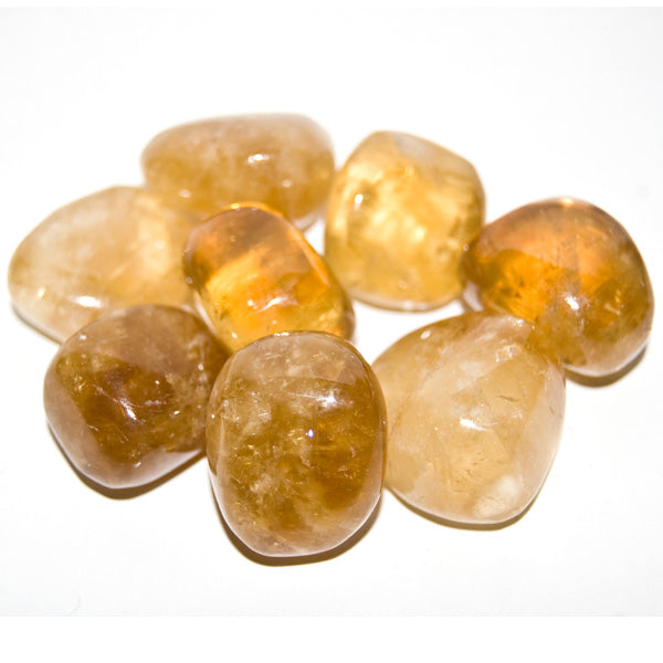 Smooth, tumbled, semi-translucent, light honey colored stones with a shiny waxy finish