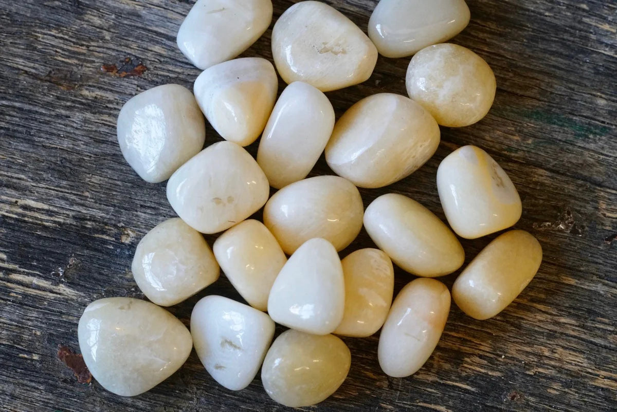 smooth, tumbled, white stones with a waxy finish