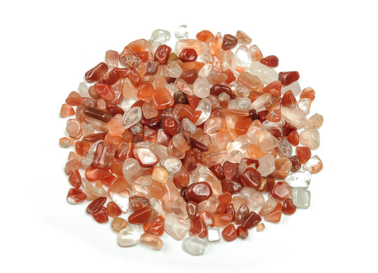 tiny tumbled pieces of smooth, semi-translucent stones ranging from brown to orange to clear