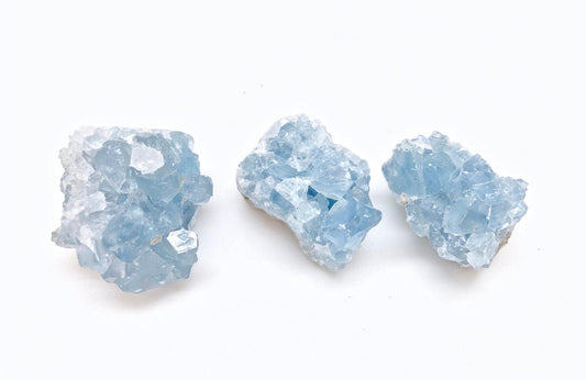 semi-translucent rough light blue stones with white stone matrix attached