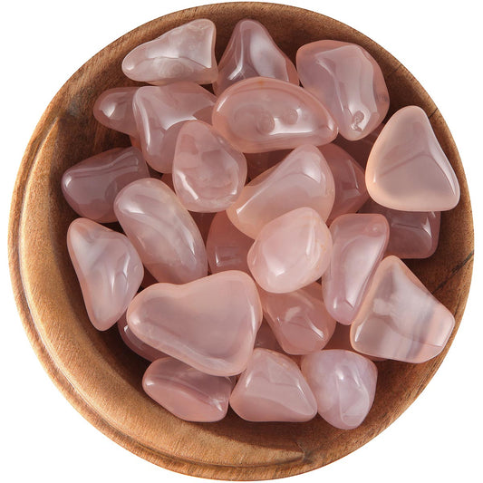 semi-translucent pink and orange coloured stones, tumbled, smooth, with a glossy shiny finish