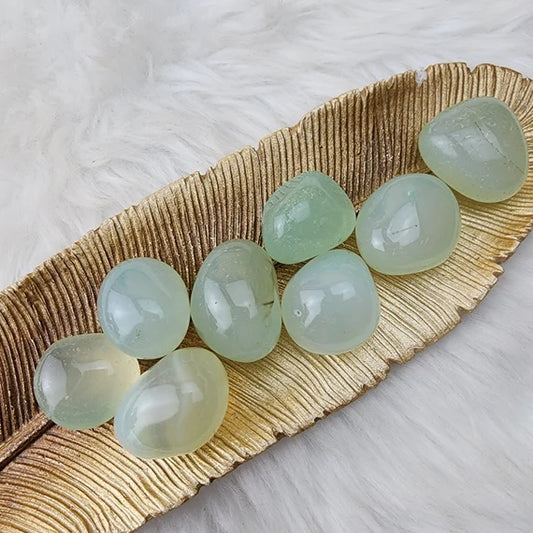 smooth, tumbled, roundish stones in a bluish green color