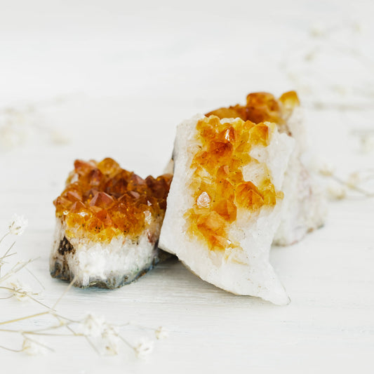 1-2 inch pieces of raw citrine clusters in ranging yellow and orange shades