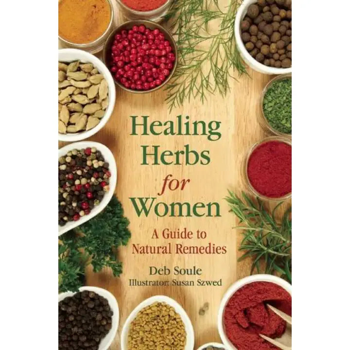 Book cover of 'Healing Herbs for Women' with herbs and spices on a wooden background