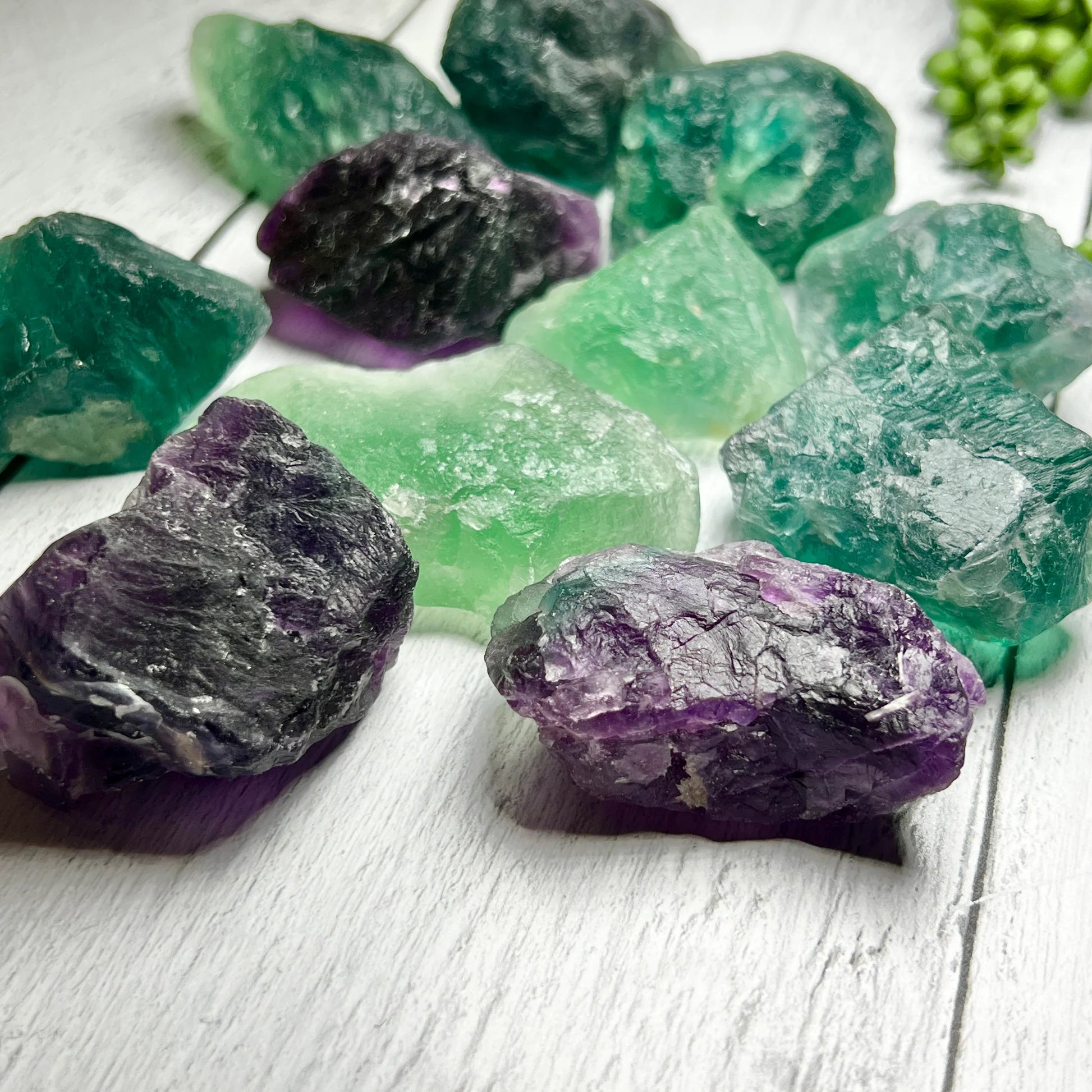 rough pieces of stones in varying shades or green, mint, and purple