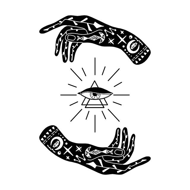 Two hands holding an esoteric eye with symbols on the hands