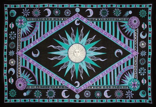 A square black tapestry or wall hanging featuring a central sun motif surrounded by geometric and celestial patterns in teal, purple, pink, and white.