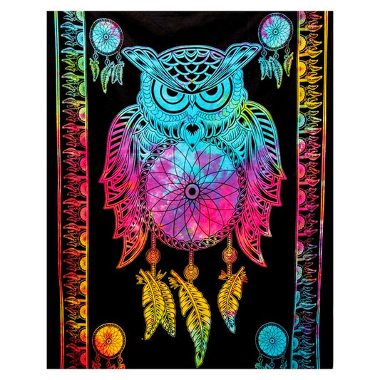 A black tapestry featuring a vibrant, neon rainbow-colored dreamcatcher owl design with matching hanging feathers and circular web motifs.
