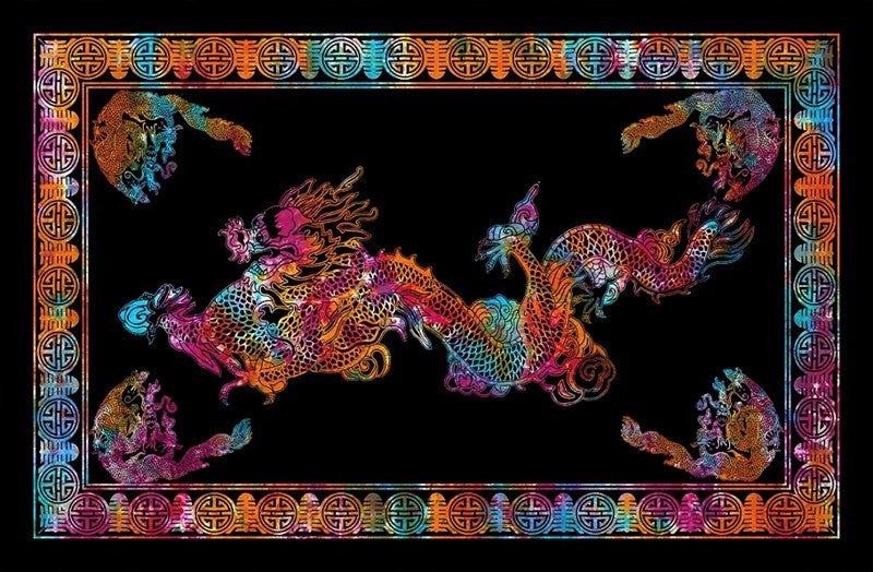 A square black textile or wall art piece featuring a vibrant, multicolored dragon design in the center, surrounded by a decorative border with repeating circular motifs in rainbow hues.