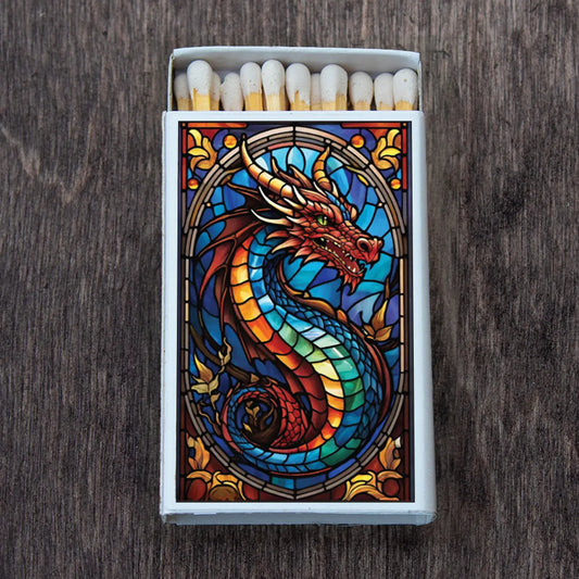 image of open matchbox, stained glass dragon