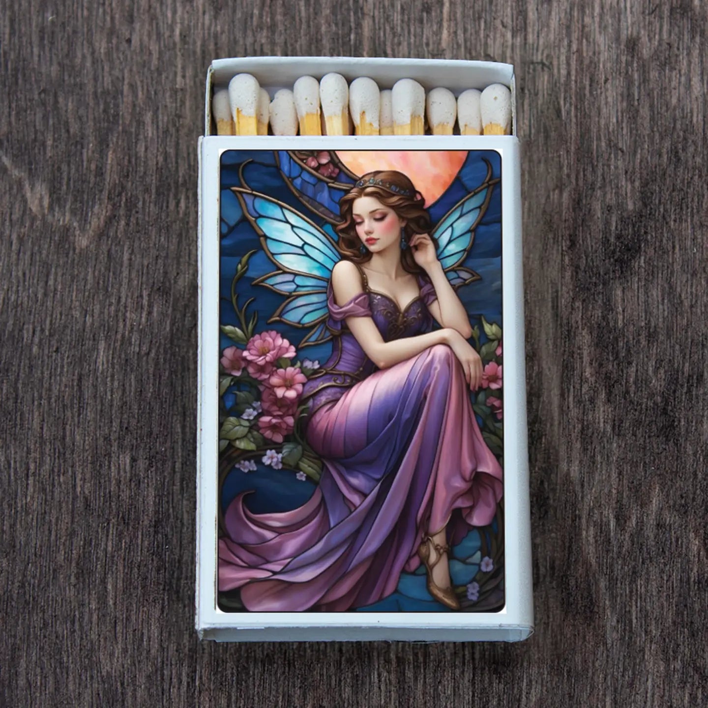fairy perched on flowers, blues, pinks, lavender.