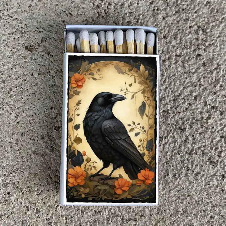 raven surrounded by foliage before a yellow oval