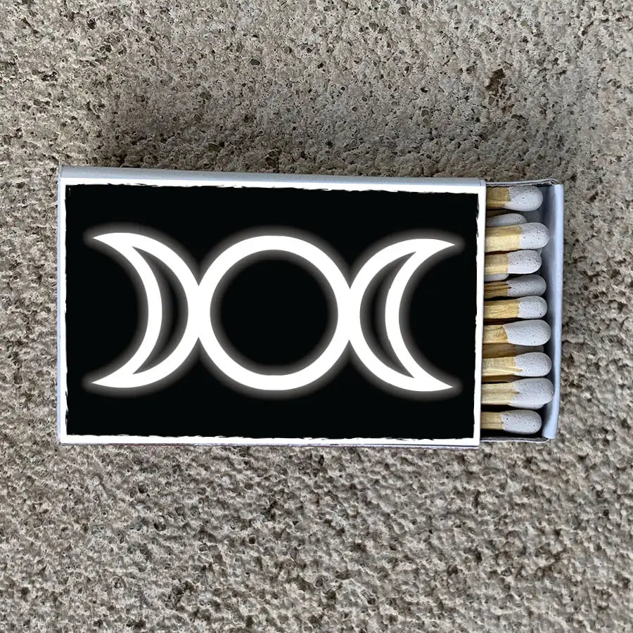 black and white stylized triple moon