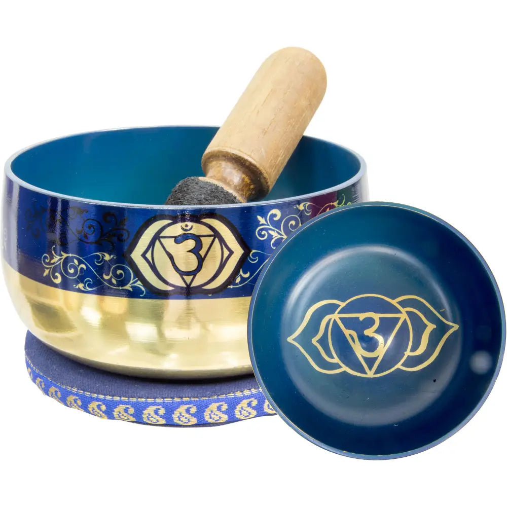 singing bowl, blue and brass with thrird eye chakra image